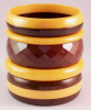 BB190 stack of brown/corn bakelite bangles